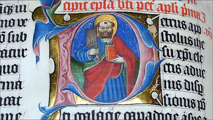 Latin text in black and red ink with a blue and red illustration of a bearded man holding a book and a tool like a hatchet