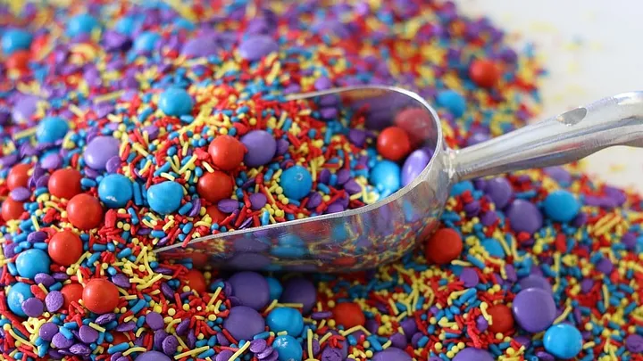 shoveling candy sprinkles