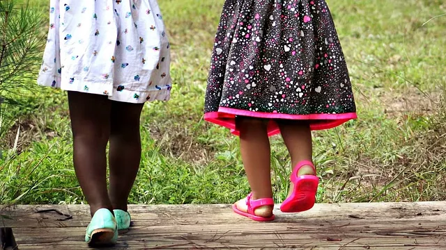 kids in skirts and sandals, walking