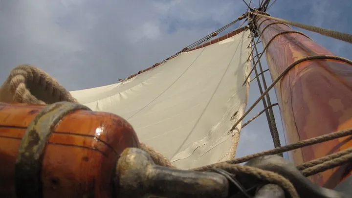 sail, viewed from the deck of a ship, gazing up the mast